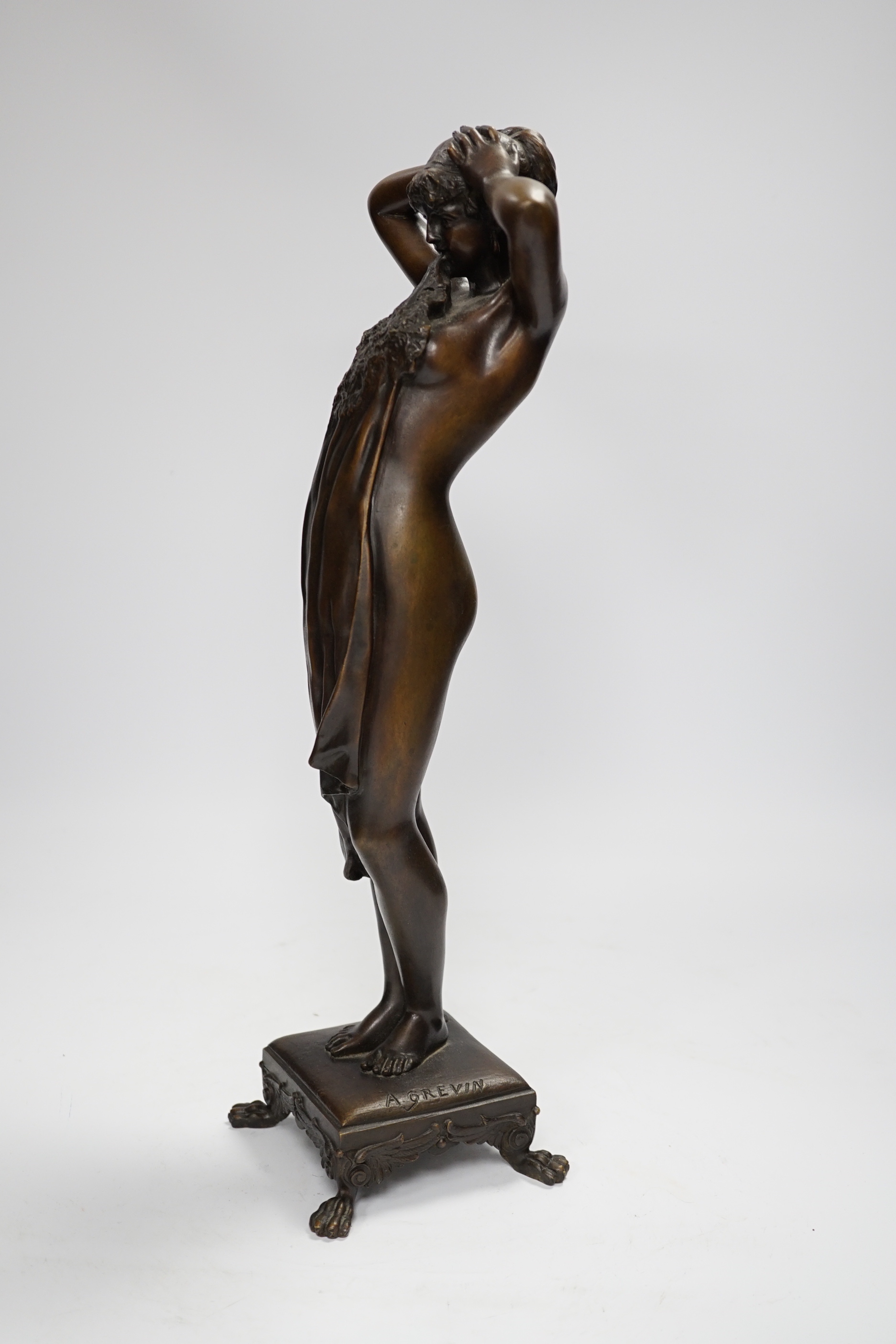 After Alfred Grevin (French, 1827-1892). A bronze study of an Art Nouveau female nude, signed to base, 41cm high